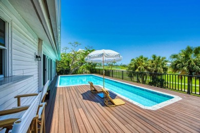 This beautifully maintained island home offers peace of mind and on The Dunes Golf and Tennis Club in Florida - for sale on GolfHomes.com, golf home, golf lot