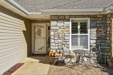 Perched overlooking the golf course, this  two-bedroom on Pointe Royale Village Country Club in Missouri - for sale on GolfHomes.com, golf home, golf lot