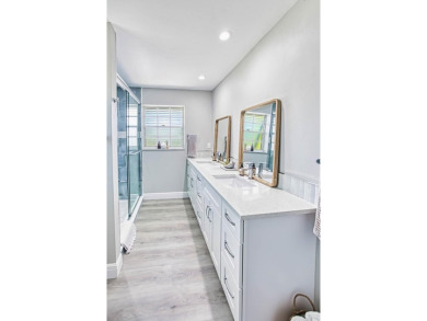 This beautifully maintained island home offers peace of mind and on The Dunes Golf and Tennis Club in Florida - for sale on GolfHomes.com, golf home, golf lot