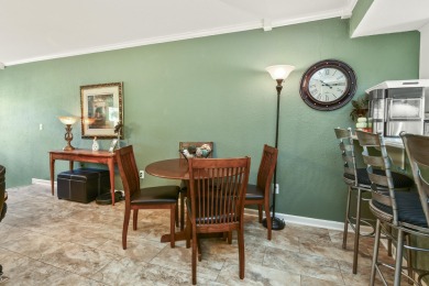 Perched overlooking the golf course, this  two-bedroom on Pointe Royale Village Country Club in Missouri - for sale on GolfHomes.com, golf home, golf lot