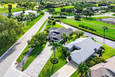 This beautifully renovated home sits on a spacious corner lot on  in Florida - for sale on GolfHomes.com, golf home, golf lot