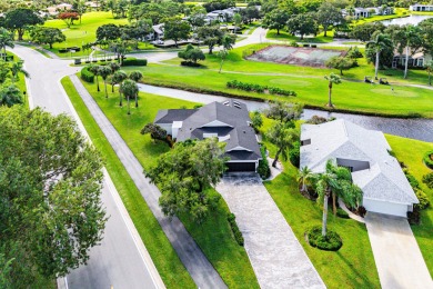 This beautifully renovated home sits on a spacious corner lot on  in Florida - for sale on GolfHomes.com, golf home, golf lot