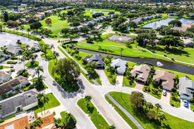 This beautifully renovated home sits on a spacious corner lot on  in Florida - for sale on GolfHomes.com, golf home, golf lot