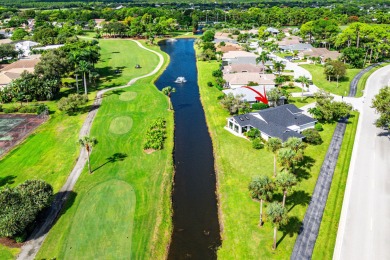 This beautifully renovated home sits on a spacious corner lot on  in Florida - for sale on GolfHomes.com, golf home, golf lot