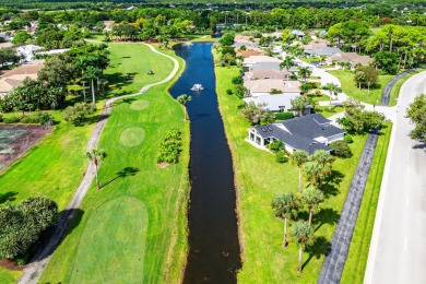 This beautifully renovated home sits on a spacious corner lot on  in Florida - for sale on GolfHomes.com, golf home, golf lot
