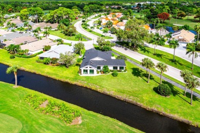 This beautifully renovated home sits on a spacious corner lot on  in Florida - for sale on GolfHomes.com, golf home, golf lot