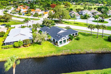 This beautifully renovated home sits on a spacious corner lot on  in Florida - for sale on GolfHomes.com, golf home, golf lot