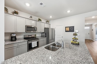 Step into this well maintained 3-bedroom, 2-bath home that on Palmetto Greens Golf and Country Club in South Carolina - for sale on GolfHomes.com, golf home, golf lot