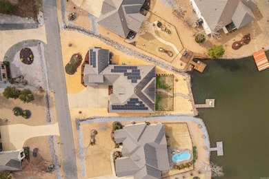Stunning Lake Maria home featuring a private boat dock and on Isabella Golf Course  in Arkansas - for sale on GolfHomes.com, golf home, golf lot