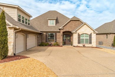 Stunning Lake Maria home featuring a private boat dock and on Isabella Golf Course  in Arkansas - for sale on GolfHomes.com, golf home, golf lot