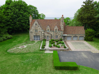 Elegant English Manor with 244 ft. of private Lake Michigan on Harbour Shores Golf Course in Michigan - for sale on GolfHomes.com, golf home, golf lot