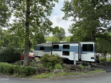 Beautifully landscaped pull-through corner RV lot in the sought on Bent Creek Golf Course in Tennessee - for sale on GolfHomes.com, golf home, golf lot