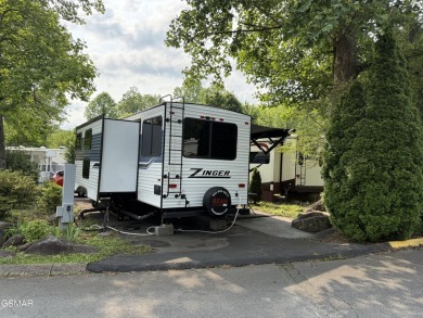 Beautifully landscaped pull-through corner RV lot in the sought on Bent Creek Golf Course in Tennessee - for sale on GolfHomes.com, golf home, golf lot