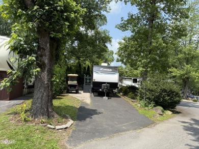 Beautifully landscaped pull-through corner RV lot in the sought on Bent Creek Golf Course in Tennessee - for sale on GolfHomes.com, golf home, golf lot