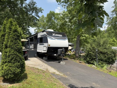 Beautifully landscaped pull-through corner RV lot in the sought on Bent Creek Golf Course in Tennessee - for sale on GolfHomes.com, golf home, golf lot