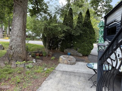 Beautifully landscaped pull-through corner RV lot in the sought on Bent Creek Golf Course in Tennessee - for sale on GolfHomes.com, golf home, golf lot