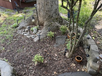 Beautifully landscaped pull-through corner RV lot in the sought on Bent Creek Golf Course in Tennessee - for sale on GolfHomes.com, golf home, golf lot
