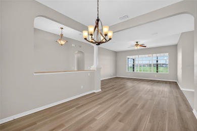 EXCEPTIONAL GOLF FRONT and WATER VIEW Birch-Palmer model home on Stonecrest Golf and Club Club in Florida - for sale on GolfHomes.com, golf home, golf lot