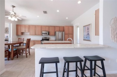 Welcome to this beautiful open-concept pool home in the highly on Colonial Country Club in Florida - for sale on GolfHomes.com, golf home, golf lot