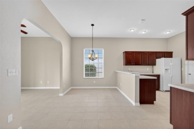 EXCEPTIONAL GOLF FRONT and WATER VIEW Birch-Palmer model home on Stonecrest Golf and Club Club in Florida - for sale on GolfHomes.com, golf home, golf lot