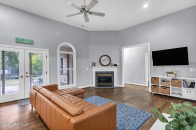 Tucked away on a spacious, pie-shaped lot, this hidden gem on on Olde Point Golf and Country Club in North Carolina - for sale on GolfHomes.com, golf home, golf lot