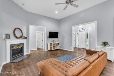 Tucked away on a spacious, pie-shaped lot, this hidden gem on on Olde Point Golf and Country Club in North Carolina - for sale on GolfHomes.com, golf home, golf lot