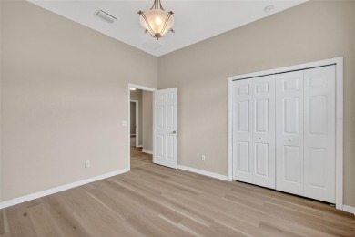 EXCEPTIONAL GOLF FRONT and WATER VIEW Birch-Palmer model home on Stonecrest Golf and Club Club in Florida - for sale on GolfHomes.com, golf home, golf lot