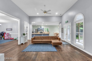 Tucked away on a spacious, pie-shaped lot, this hidden gem on on Olde Point Golf and Country Club in North Carolina - for sale on GolfHomes.com, golf home, golf lot