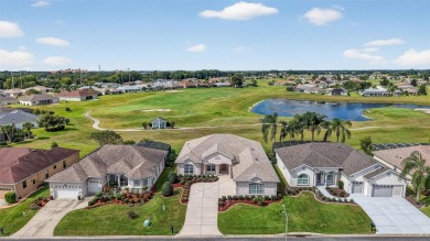 EXCEPTIONAL GOLF FRONT and WATER VIEW Birch-Palmer model home on Stonecrest Golf and Club Club in Florida - for sale on GolfHomes.com, golf home, golf lot