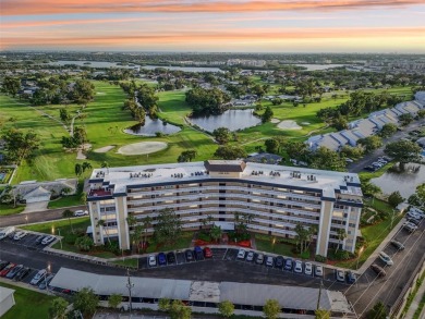 Stunning golf course and pond views from a light-filled corner on Seminole Lake Country Club in Florida - for sale on GolfHomes.com, golf home, golf lot