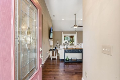 As you arrive to this custom built home, you're greeted by lush on Brunswick Plantation and Golf Resorts in North Carolina - for sale on GolfHomes.com, golf home, golf lot