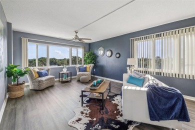Stunning golf course and pond views from a light-filled corner on Seminole Lake Country Club in Florida - for sale on GolfHomes.com, golf home, golf lot