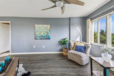 Stunning golf course and pond views from a light-filled corner on Seminole Lake Country Club in Florida - for sale on GolfHomes.com, golf home, golf lot