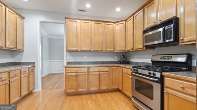 Discover this beautifully maintained 5-bedroom, 3.5 bath home on Summergrove Golf Club in Georgia - for sale on GolfHomes.com, golf home, golf lot