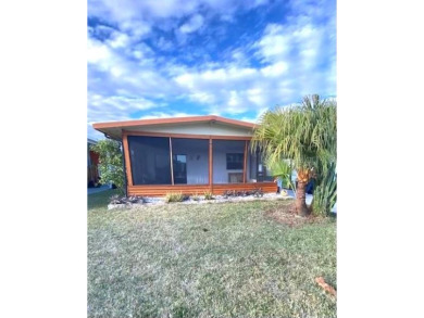 A darling, Beachside gem!  This two bedroom two bath home not on Grand Haven Golf Club in Florida - for sale on GolfHomes.com, golf home, golf lot