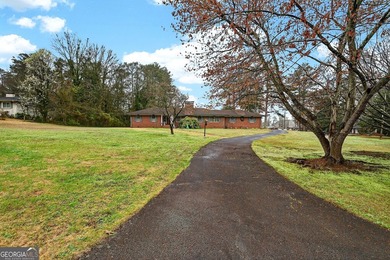 Nestled on one of the largest residential lots in the charming on College Park Municipal Golf Course in Georgia - for sale on GolfHomes.com, golf home, golf lot
