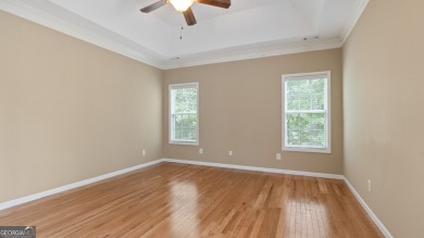 Discover this beautifully maintained 5-bedroom, 3.5 bath home on Summergrove Golf Club in Georgia - for sale on GolfHomes.com, golf home, golf lot