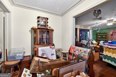 Nestled on one of the largest residential lots in the charming on College Park Municipal Golf Course in Georgia - for sale on GolfHomes.com, golf home, golf lot