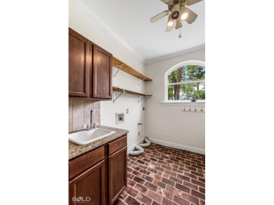 Welcome to your dream home in the prestigious Southern Trace on Southern Trace Country Club in Louisiana - for sale on GolfHomes.com, golf home, golf lot
