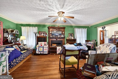 Nestled on one of the largest residential lots in the charming on College Park Municipal Golf Course in Georgia - for sale on GolfHomes.com, golf home, golf lot