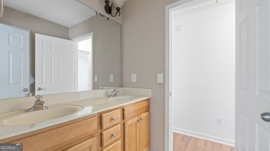 Discover this beautifully maintained 5-bedroom, 3.5 bath home on Summergrove Golf Club in Georgia - for sale on GolfHomes.com, golf home, golf lot
