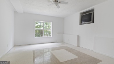 Discover this beautifully maintained 5-bedroom, 3.5 bath home on Summergrove Golf Club in Georgia - for sale on GolfHomes.com, golf home, golf lot
