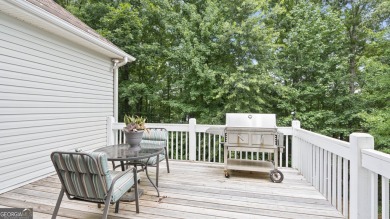 Discover this beautifully maintained 5-bedroom, 3.5 bath home on Summergrove Golf Club in Georgia - for sale on GolfHomes.com, golf home, golf lot