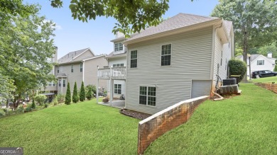 Discover this beautifully maintained 5-bedroom, 3.5 bath home on Summergrove Golf Club in Georgia - for sale on GolfHomes.com, golf home, golf lot