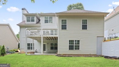 Discover this beautifully maintained 5-bedroom, 3.5 bath home on Summergrove Golf Club in Georgia - for sale on GolfHomes.com, golf home, golf lot