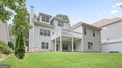 Discover this beautifully maintained 5-bedroom, 3.5 bath home on Summergrove Golf Club in Georgia - for sale on GolfHomes.com, golf home, golf lot