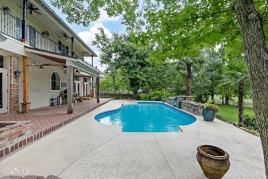 Welcome to your dream home in the prestigious Southern Trace on Southern Trace Country Club in Louisiana - for sale on GolfHomes.com, golf home, golf lot