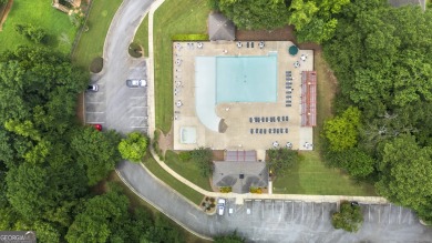 Discover this beautifully maintained 5-bedroom, 3.5 bath home on Summergrove Golf Club in Georgia - for sale on GolfHomes.com, golf home, golf lot