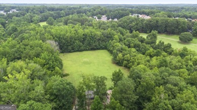Discover this beautifully maintained 5-bedroom, 3.5 bath home on Summergrove Golf Club in Georgia - for sale on GolfHomes.com, golf home, golf lot