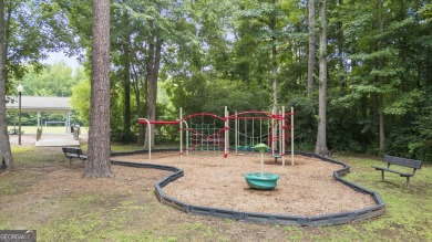 Discover this beautifully maintained 5-bedroom, 3.5 bath home on Summergrove Golf Club in Georgia - for sale on GolfHomes.com, golf home, golf lot